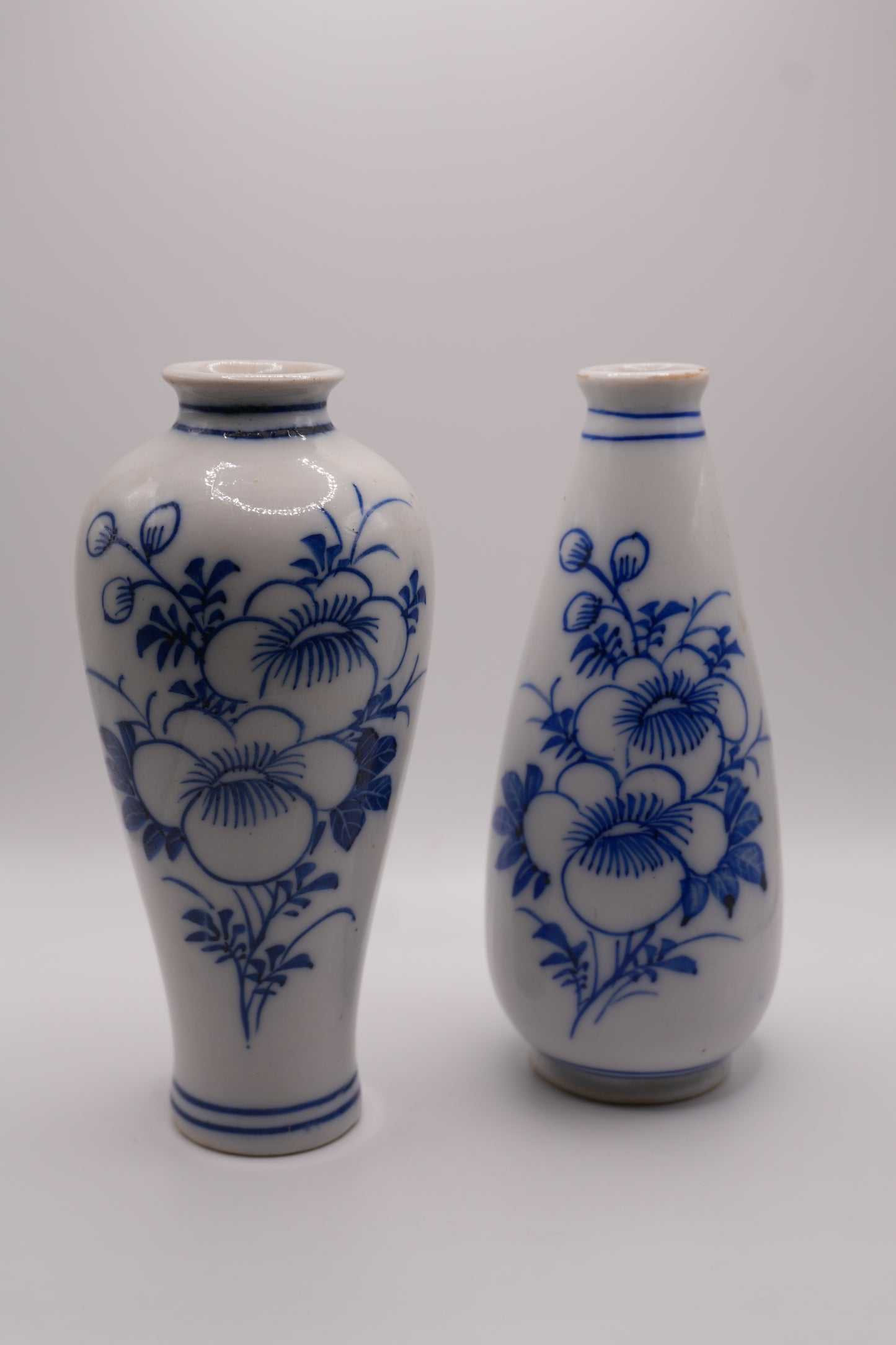 Pair of Hand-Painted Blue & White Floral Porcelain Vases