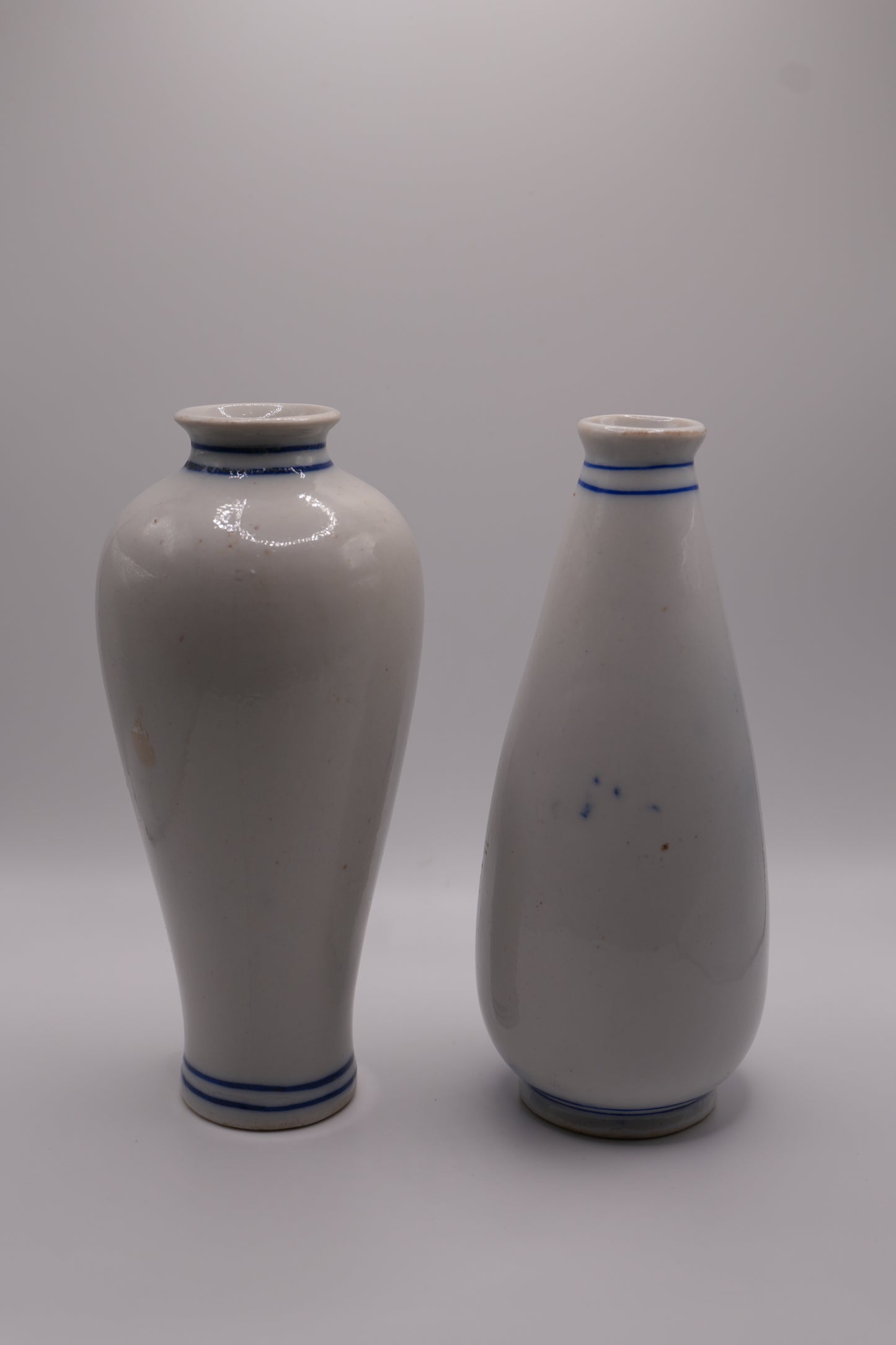 Pair of Hand-Painted Blue & White Floral Porcelain Vases